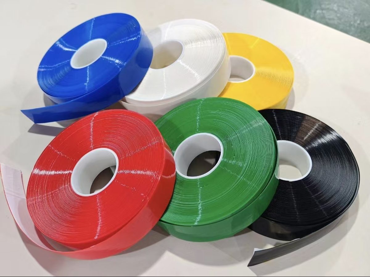 Six solid colors of 1.1 mm heavy-duty PVC floor marking tape — yellow, blue, red, green, white and black rolls